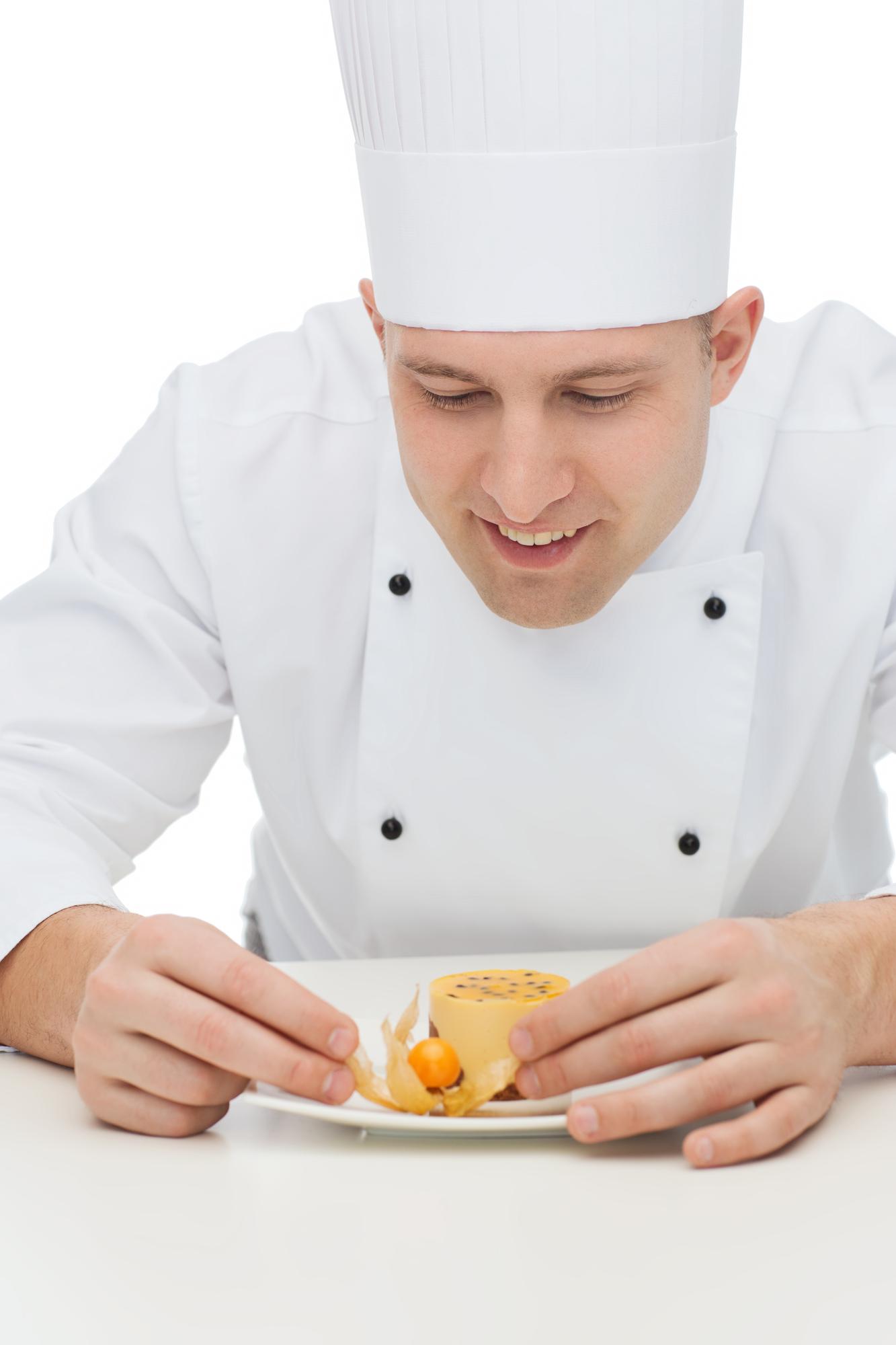 Workshop chef explaining plating to students